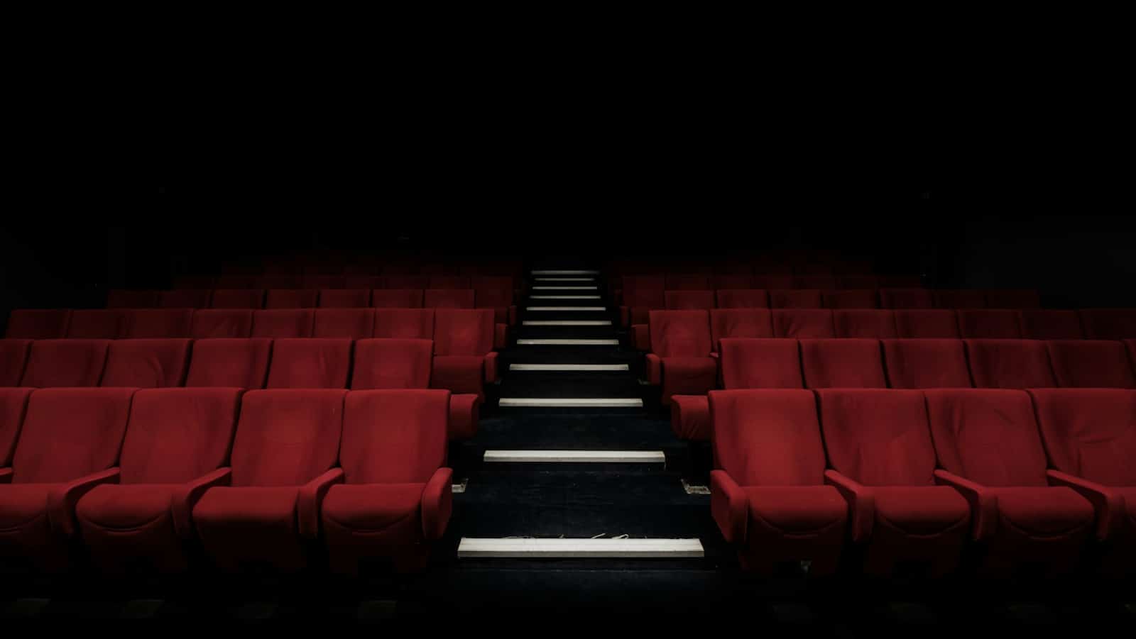 empty movie theater illustration for horror movie title article